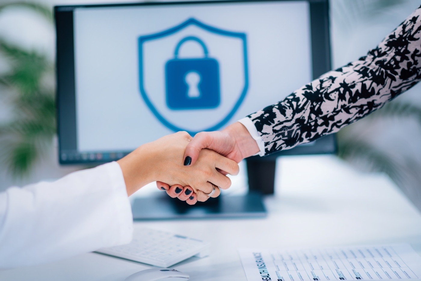 handshake-after-signing-medical-data-form-2023-11-27-05-12-48-utc